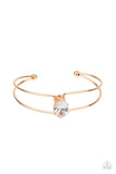 GLOW No Mercy - Gold - Paparazzi Accessories