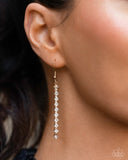 Glittery Getaway - Gold - Paparazzi Accessories