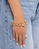 Classy Cruise - Gold - Paparazzi Accessories