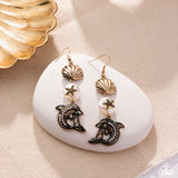 Delightful Dolphin - Gold - Paparazzi Accessories