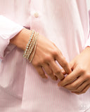 Persistent Pizzazz - Gold - Paparazzi Accessories