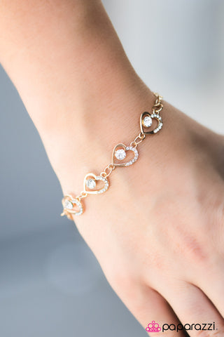 The Song Of The Heart - Gold - Paparazzi Accessories