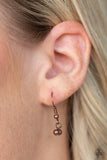 Keep Your Eye On The Pendulum - Copper - Paparazzi Accessories