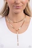 Reeling in Radiance - Gold - Paparazzi Accessories